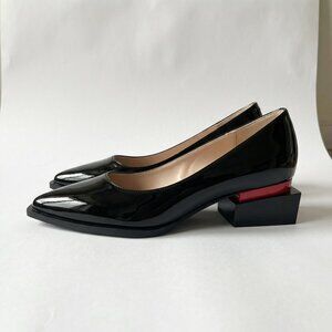 Patent leather dress shoes with architectural heel